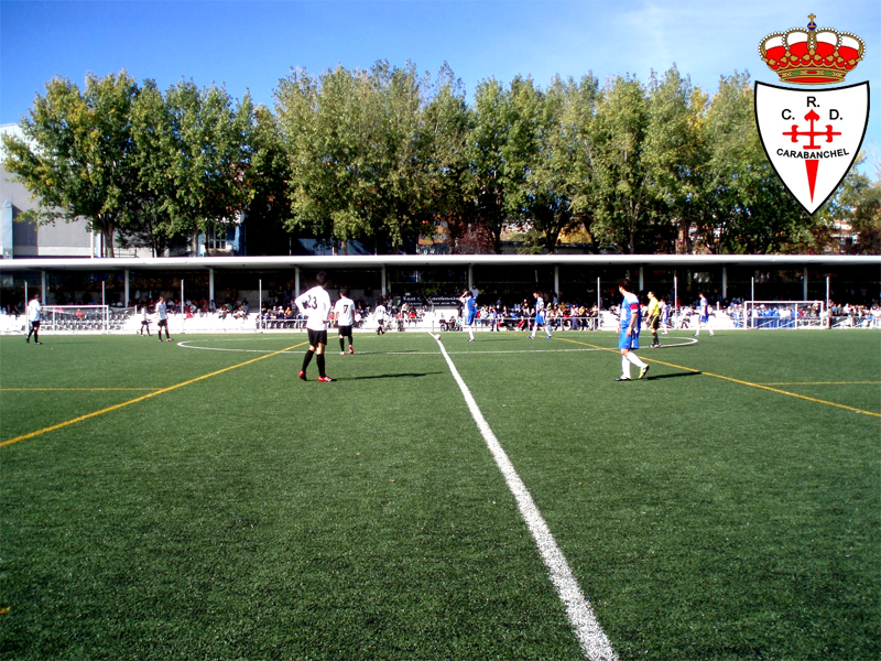 Campo de la Mina y escudo del Carabanchel